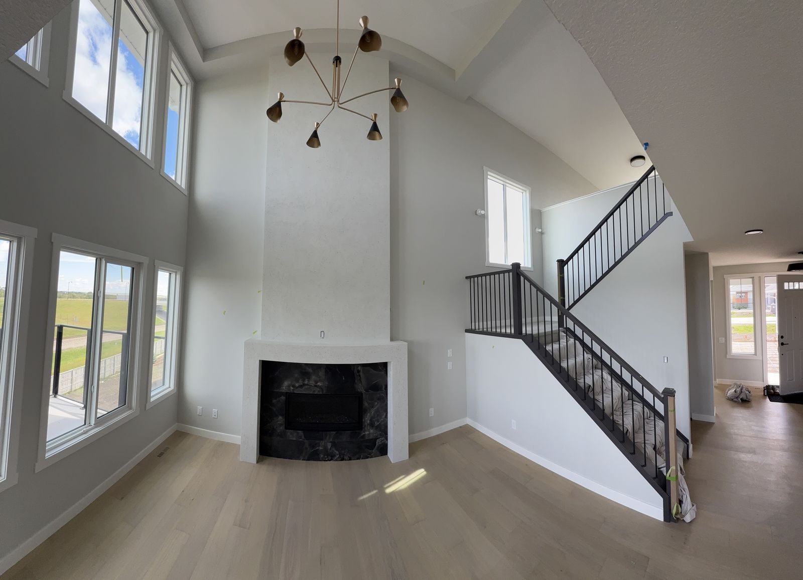 Two-storey great room in an Alliston home in Cimarron after interior painting