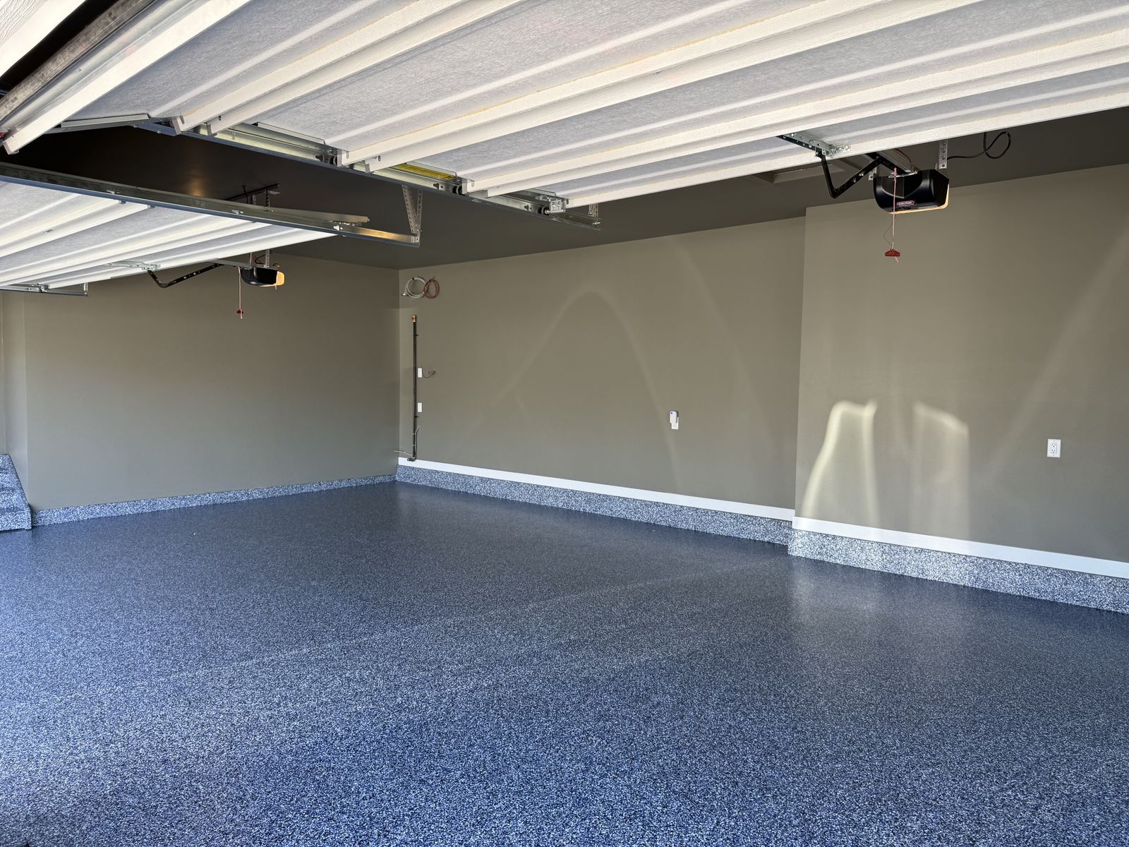 Flake epoxy garage floor at an Alliston home in Cimarron, Okotoks