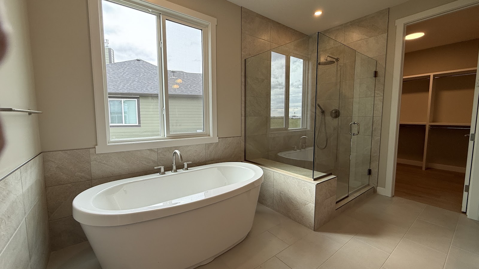 Bathroom renovation in Chestermere, freestanding tub and glass shower