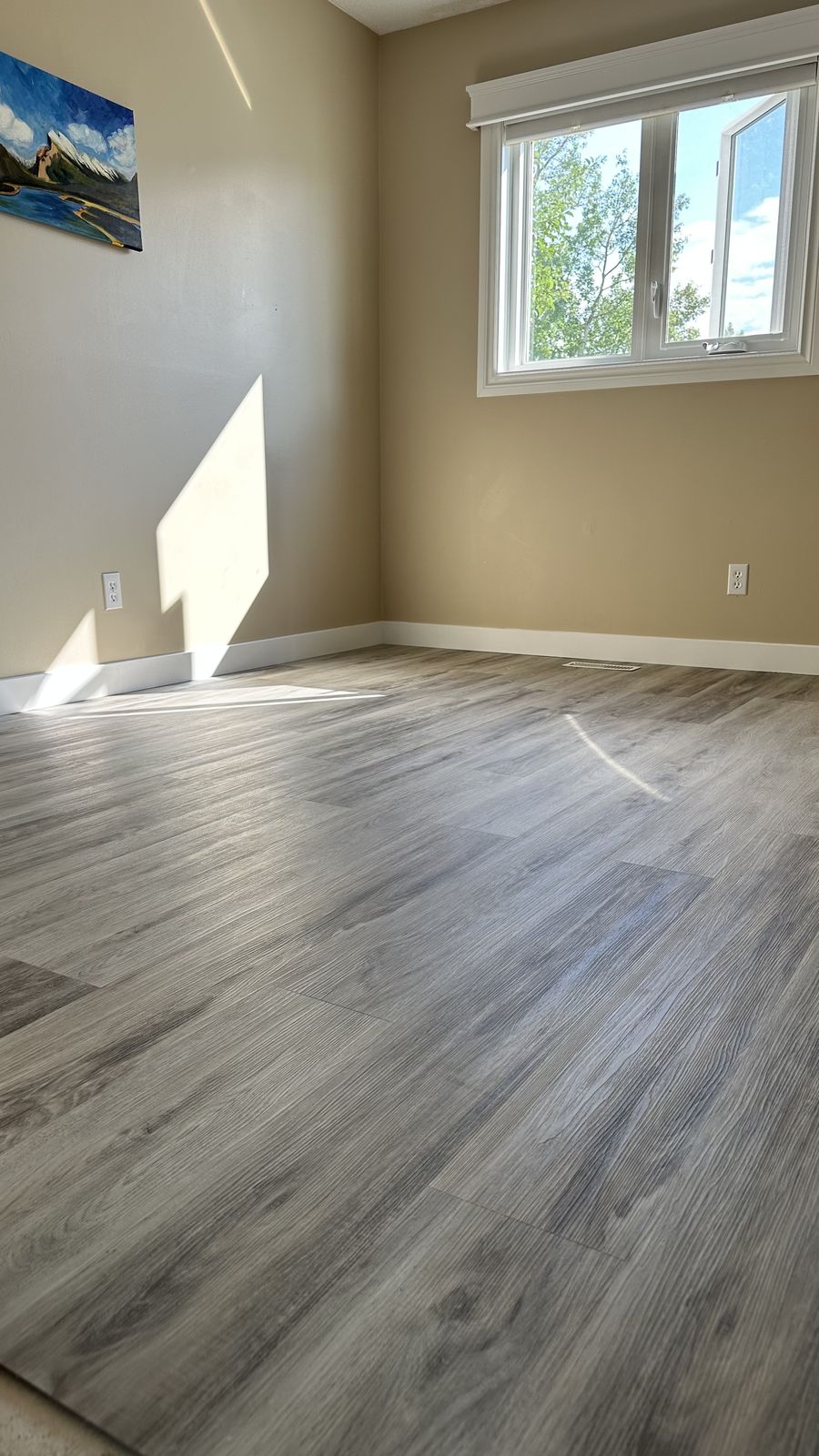 Vinyl plank flooring installed in a Calgary basement