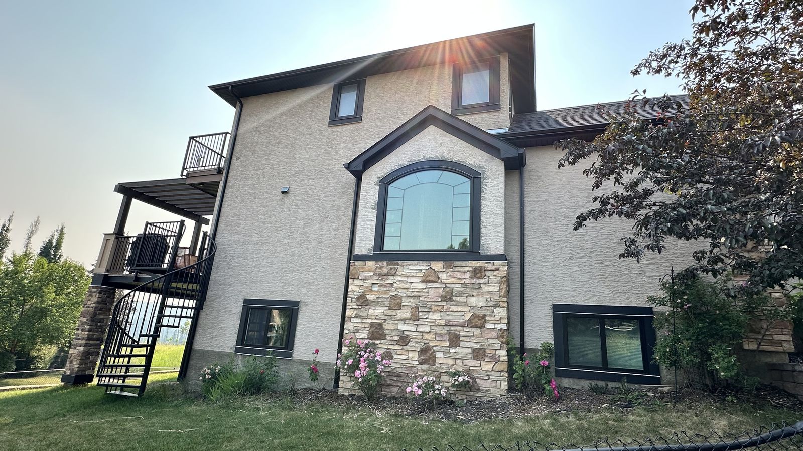 House exterior before repaint, tan stucco, Discovery Ridge