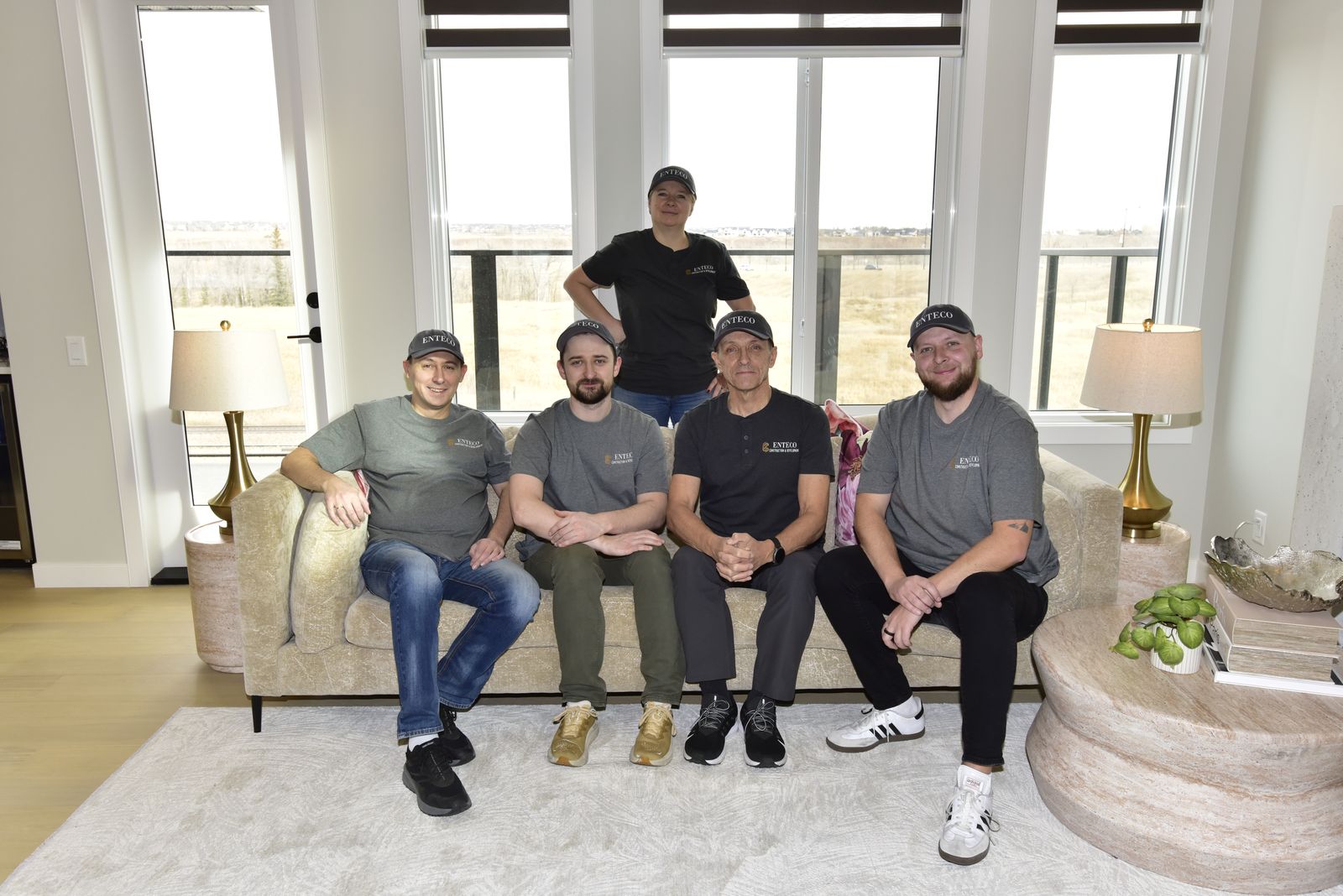 The Enteco crew in a completed Calgary living room