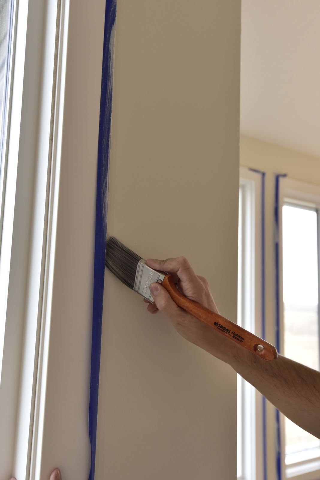 Cutting in a clean line with a brush and low-tack tape