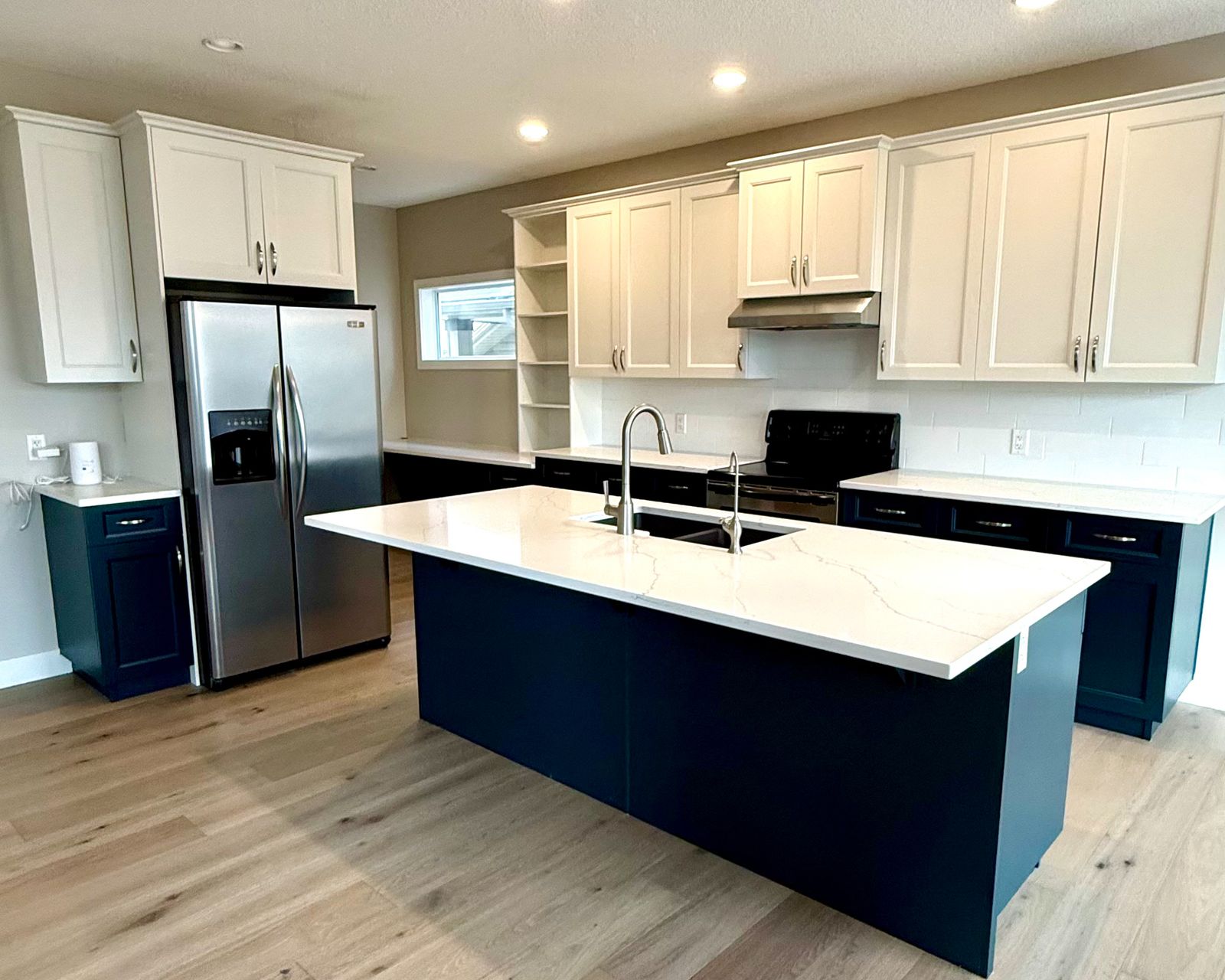 Same kitchen with navy and white painted cabinets, Everoak Park