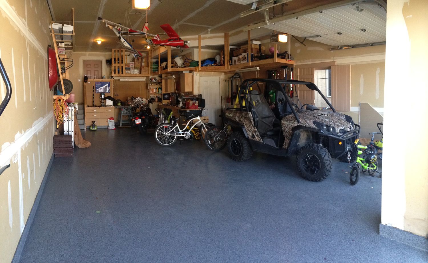 Coated garage floor in a Calgary home, flake finish