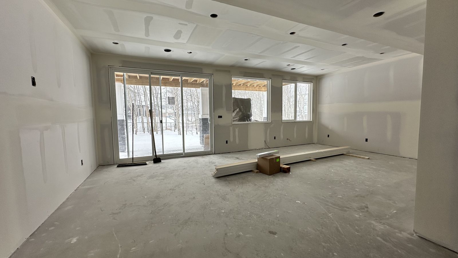 Legacy Manor basement before development, framed but unfinished
