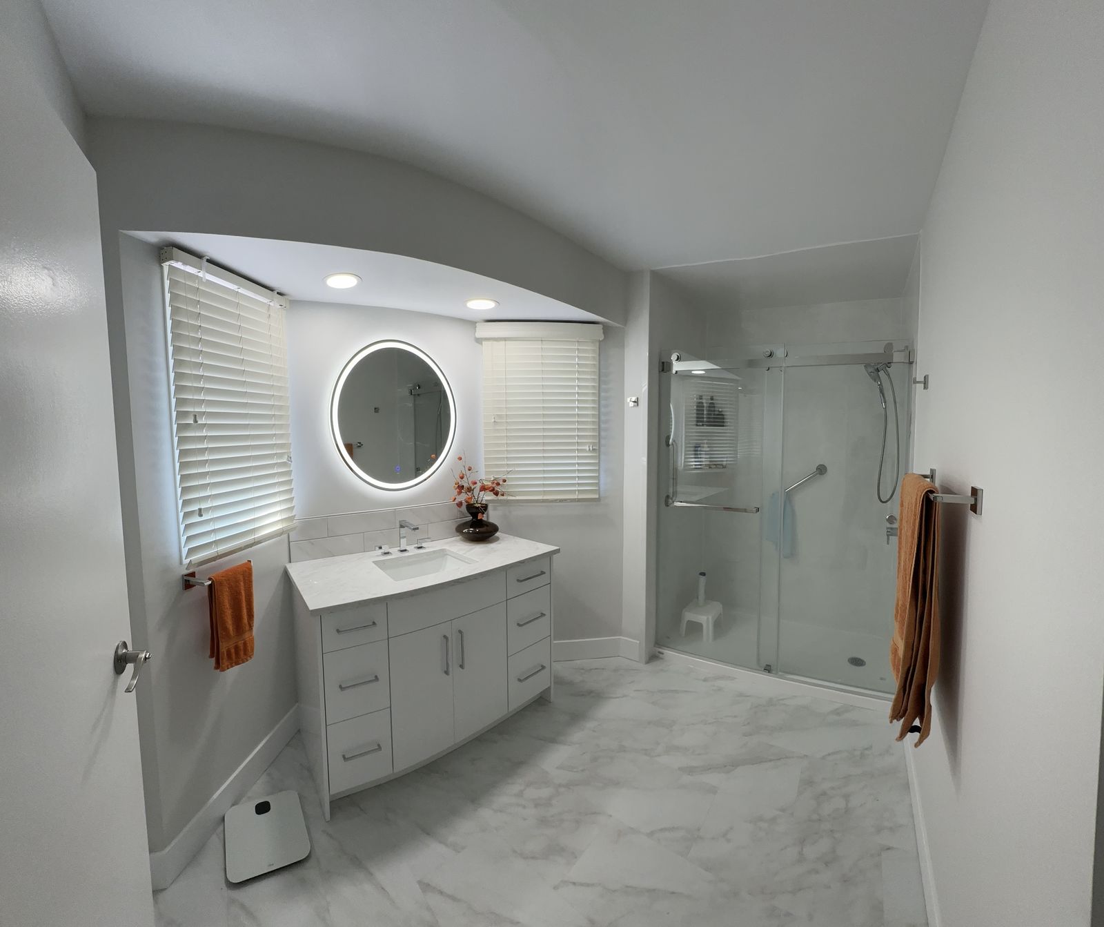 Milrise bathroom after full remodel with new tile and fixtures