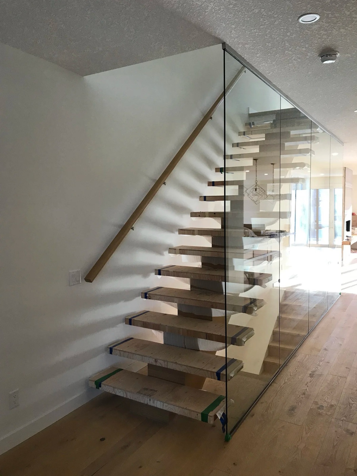 Interior staircase repaint in a Calgary home