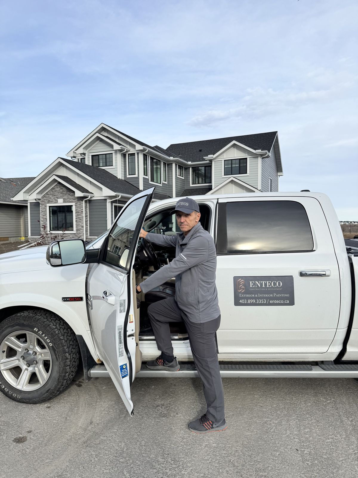 Alec Stvolin, Enteco founder, getting into the company truck at a job site